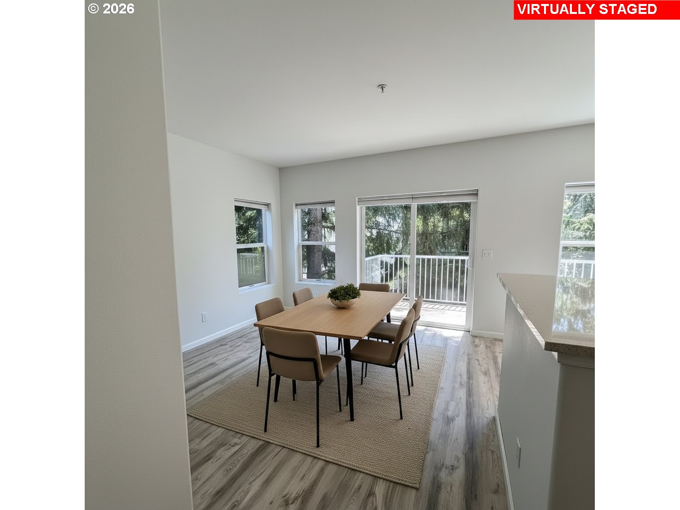 14110 Southwest Barrows Road, Unit 1 Portland, OR 97223 - Photo 7 of 18 a view of a dining room with furniture and wooden floor