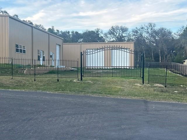 606 Hickory Ridge Road Manchaca, TX 78652 - Photo 6 of 6 a view of a house with a backyard