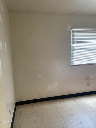 a view of a room with a window