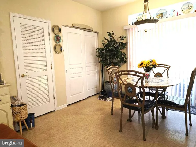 a kitchen with stainless steel appliances granite countertop a refrigerator sink and cabinets