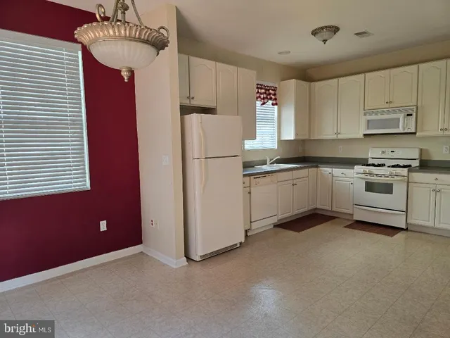 an empty room with closet area