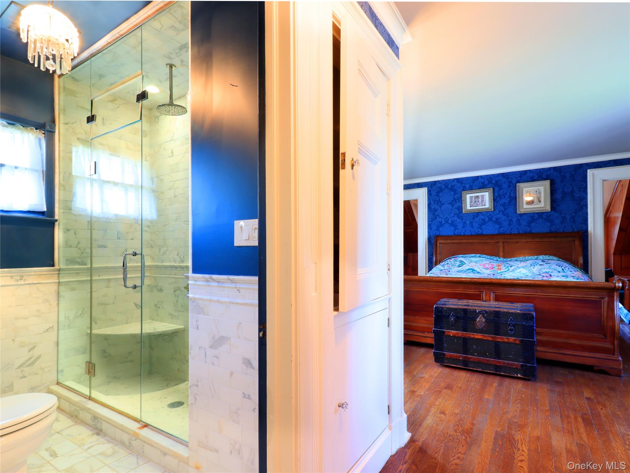 11-20 Shore Road Queens, NY 11363 - Photo 36 of 45 Glass-enclosed shower featuring a built-in bench and rainfall showerhead