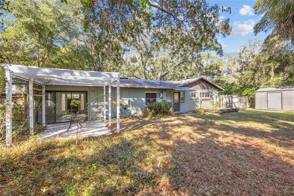 601 Northwest 36th Drive Gainesville, FL 32607 - Photo 24 of 36 a front view of a house with a porch