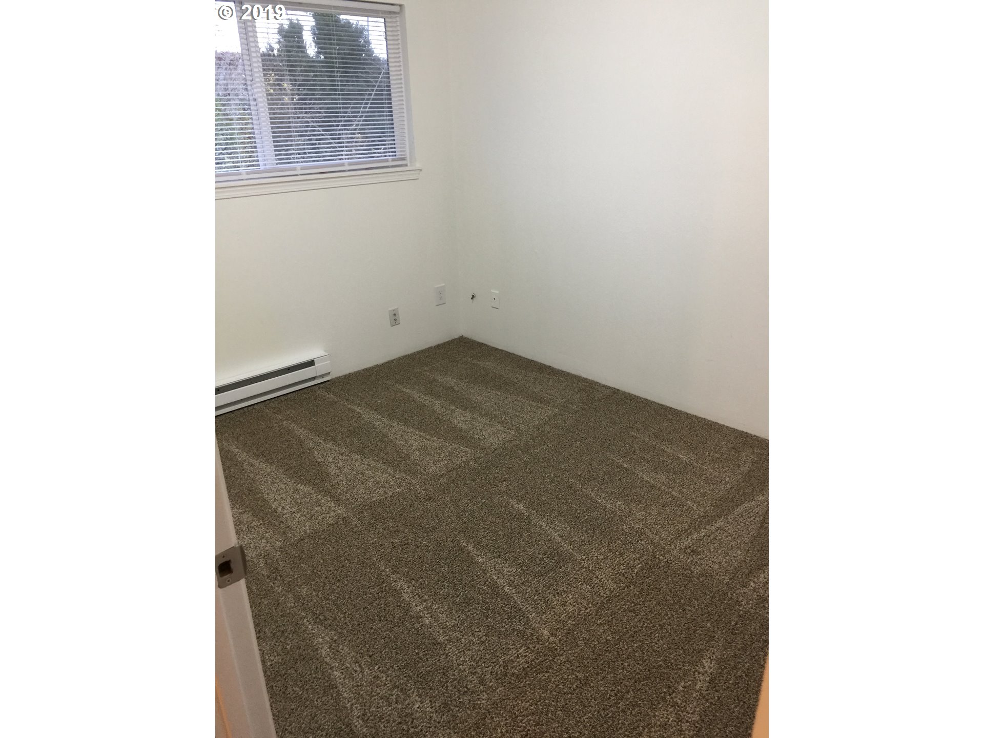 9733 Southeast Foster Road Portland, OR 97266 - Photo 14 of 16 a view of an empty room