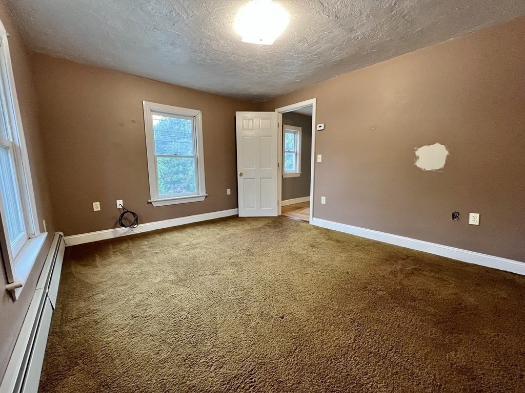 199 Main Street Rutland, MA 01543 - Photo 30 of 39 an empty room with windows