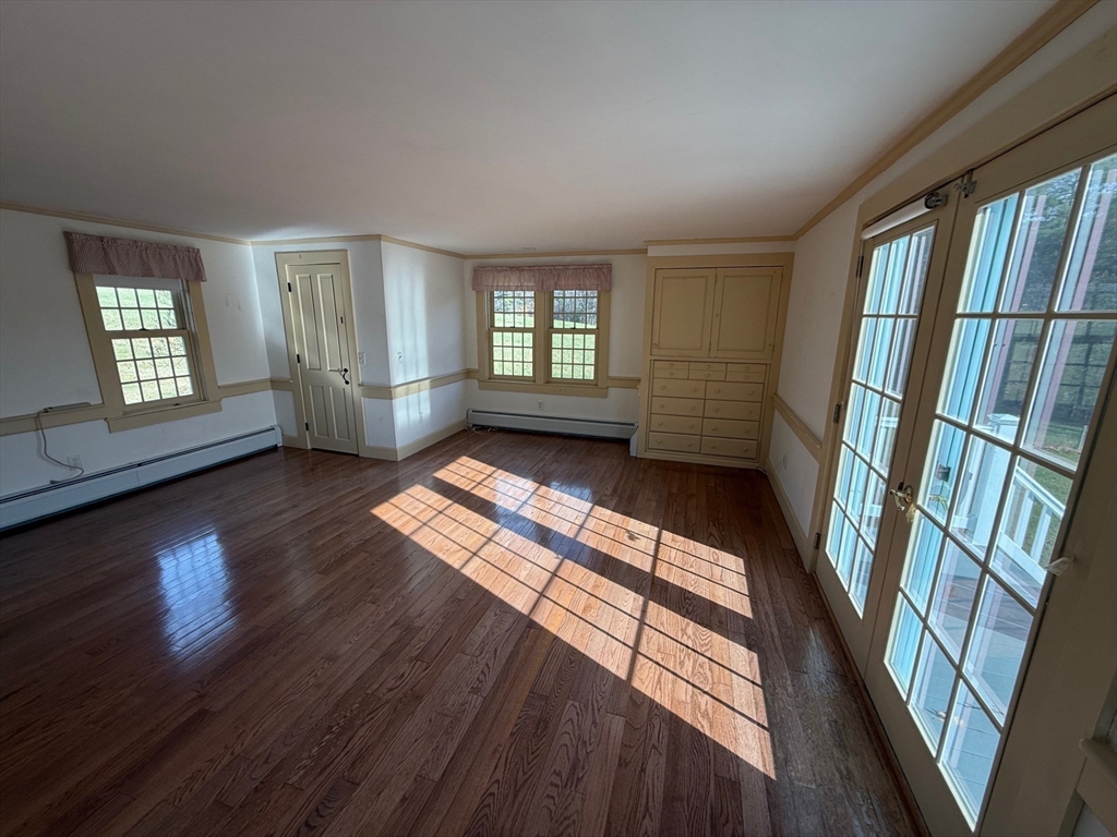 94 West Princeton Road Westminster, MA 01473 - Photo 12 of 26 wooden floor in an empty room with a window