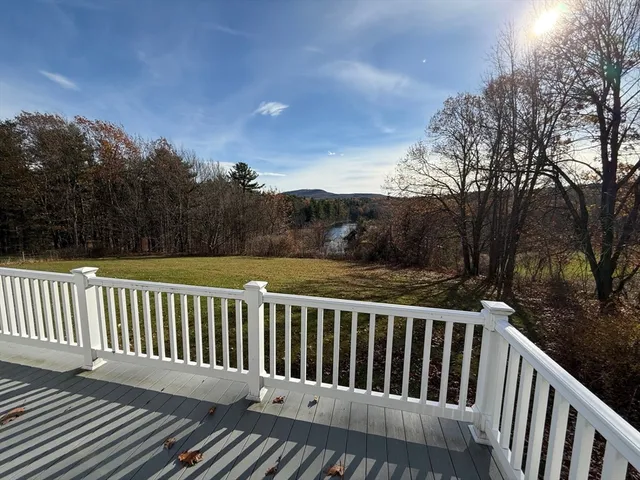 a view of a wooden roof deck