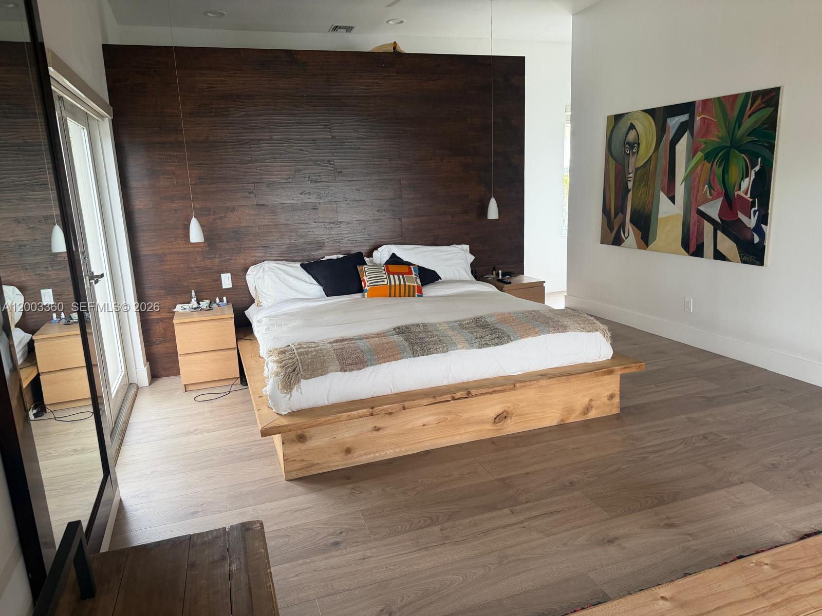 1251 Southwest 11th Terrace Boca Raton, FL 33486 - Photo 15 of 47 a bedroom with furniture and wooden floor