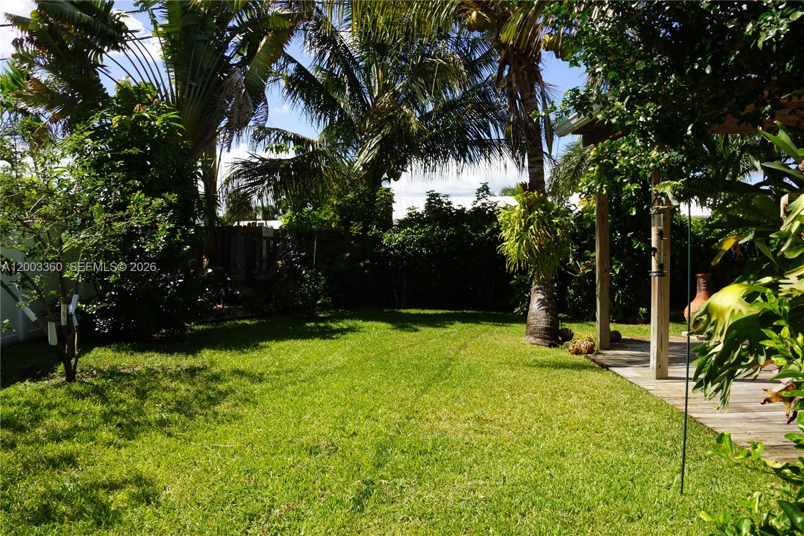 1251 Southwest 11th Terrace Boca Raton, FL 33486 - Photo 22 of 47 a view of a backyard