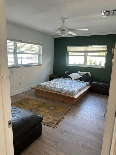 1251 Southwest 11th Terrace Boca Raton, FL 33486 - Photo 23 of 47 a bedroom with a bed and window