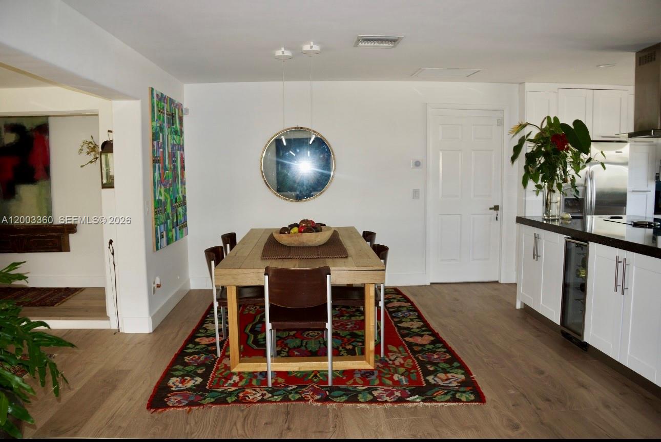 1251 Southwest 11th Terrace Boca Raton, FL 33486 - Photo 7 of 47 a living room with furniture and a potted plant
