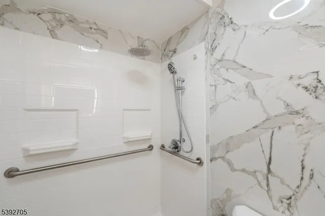 a view of a room with racks on the wall