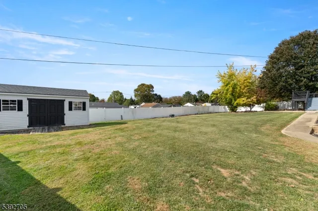 a view of a yard with an outdoor space