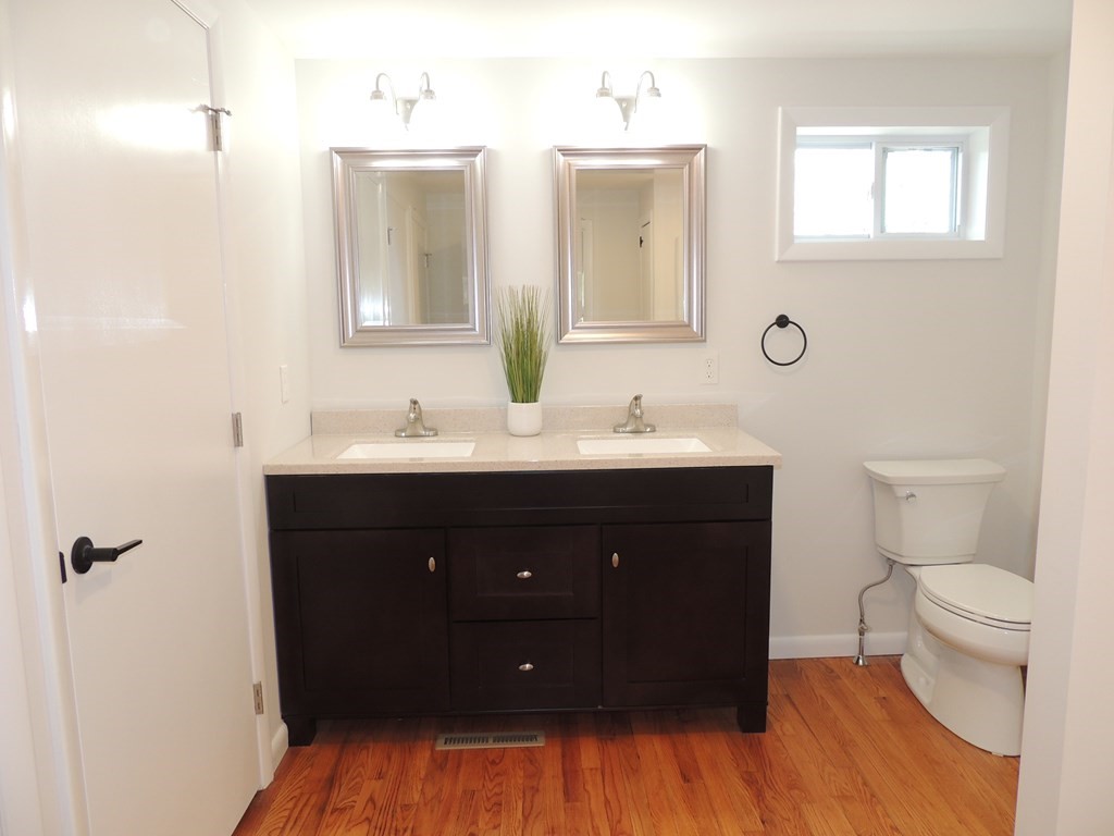 214 Wilbraham Road Monson, MA 01057 - Photo 22 of 38 a bathroom with a sink vanity and a toilet