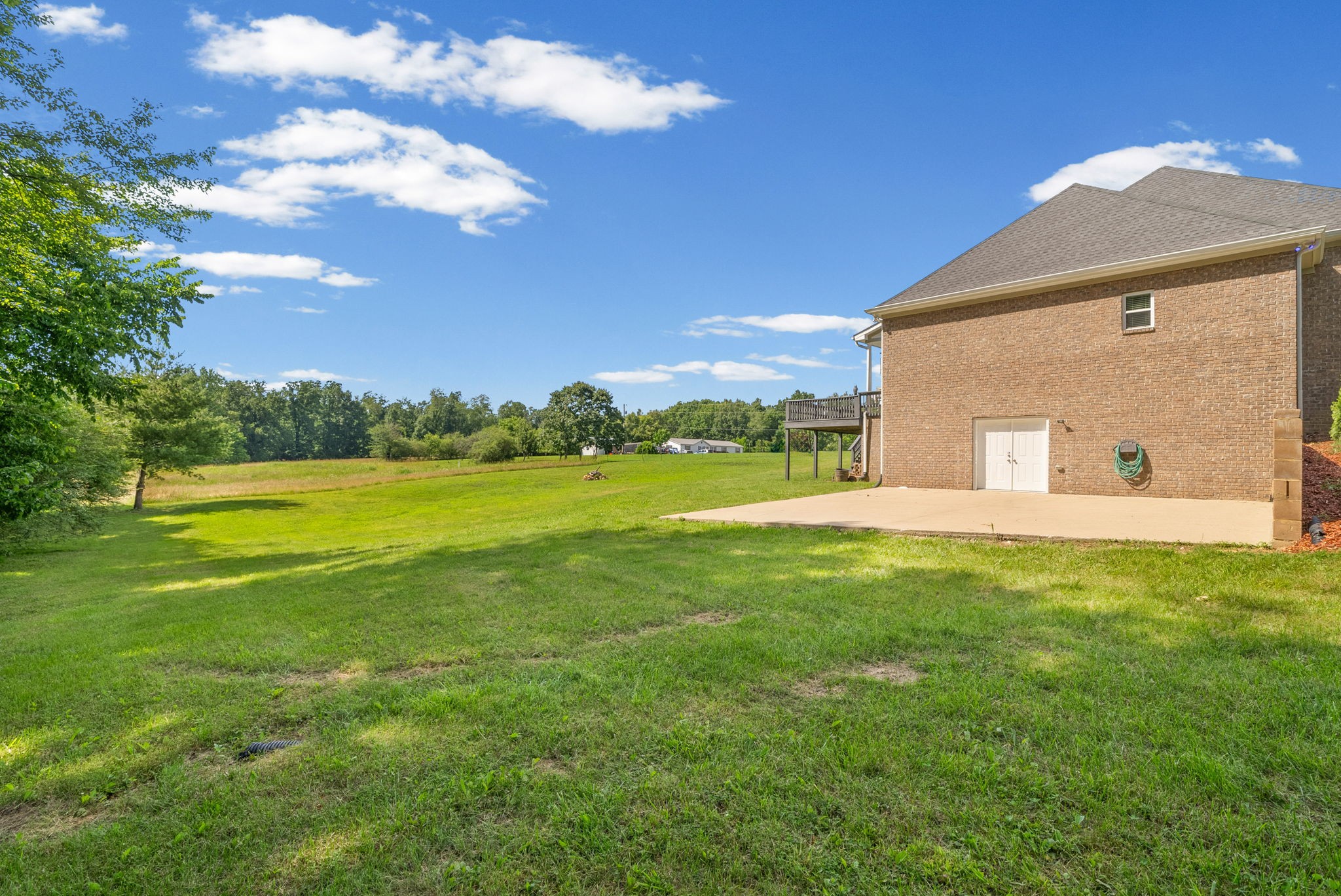 4940 Marion Road Cunningham, TN 37052 - Photo 28 of 43 a view of an house with backyard space and balcony