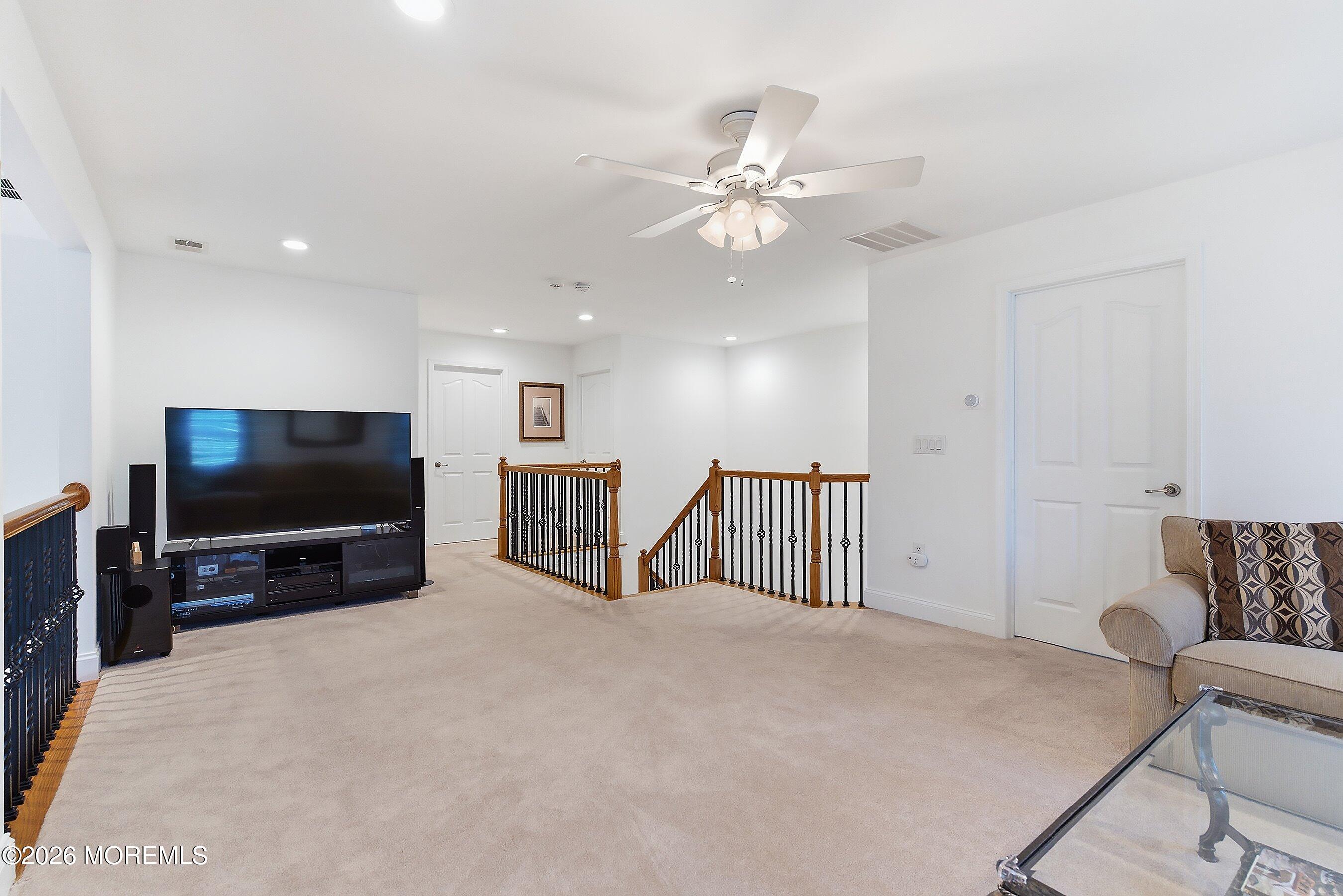 9 Margate Way Waretown, NJ 08758 - Photo 34 of 59 a view of a livingroom with furniture and a flat screen tv