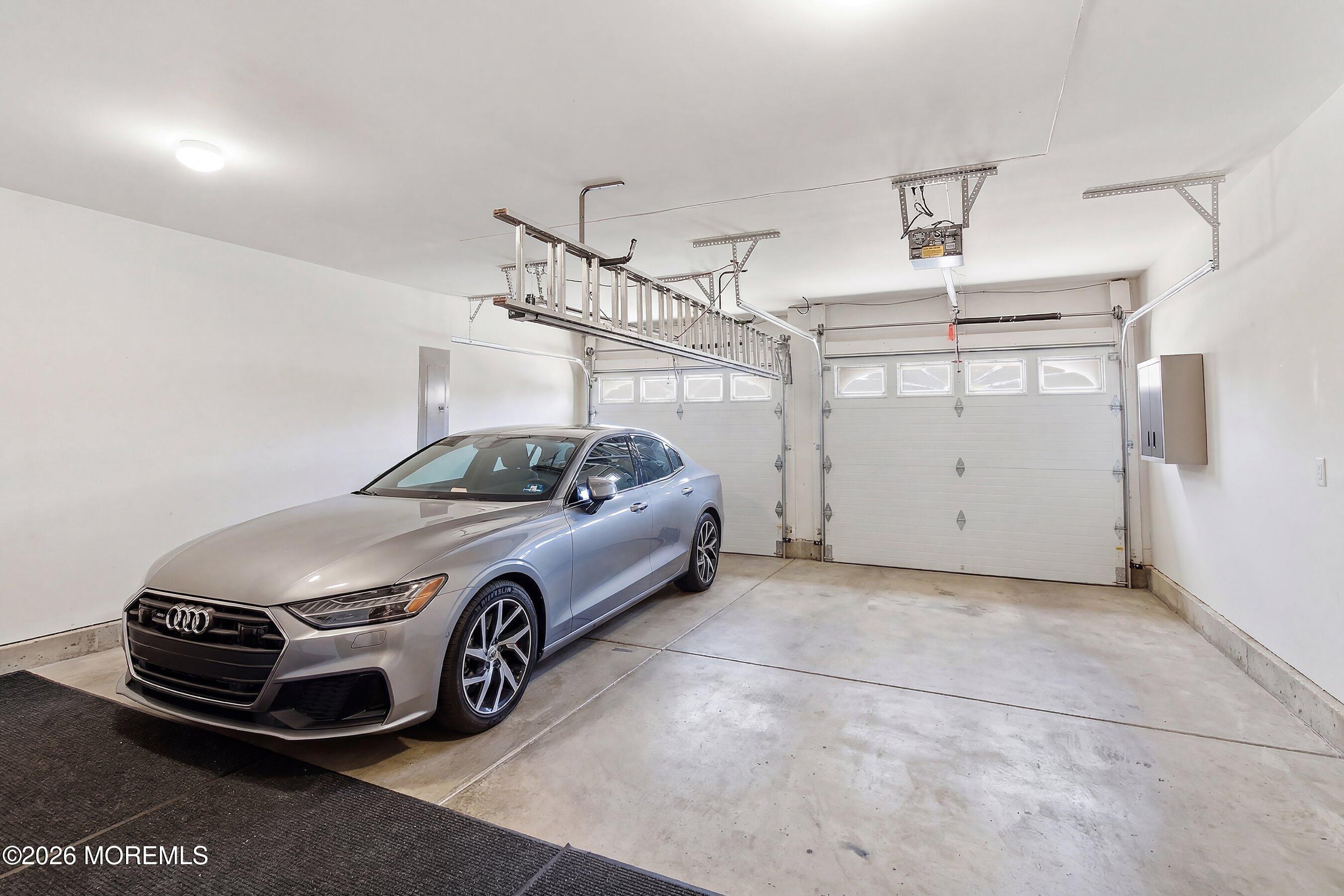 9 Margate Way Waretown, NJ 08758 - Photo 41 of 59 a car parked in a garage