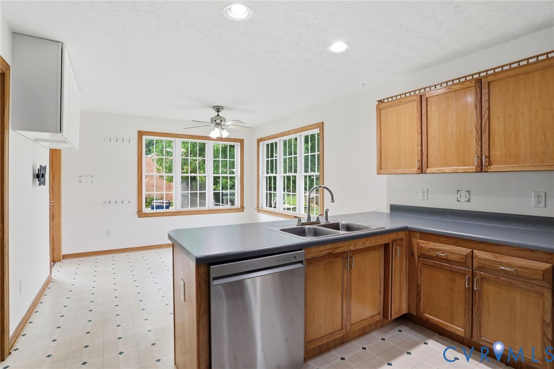 14420 Branding Iron Road Chesterfield, VA 23838 - Photo 10 of 50 Kitchen featuring wood cabinetry, stainless steel