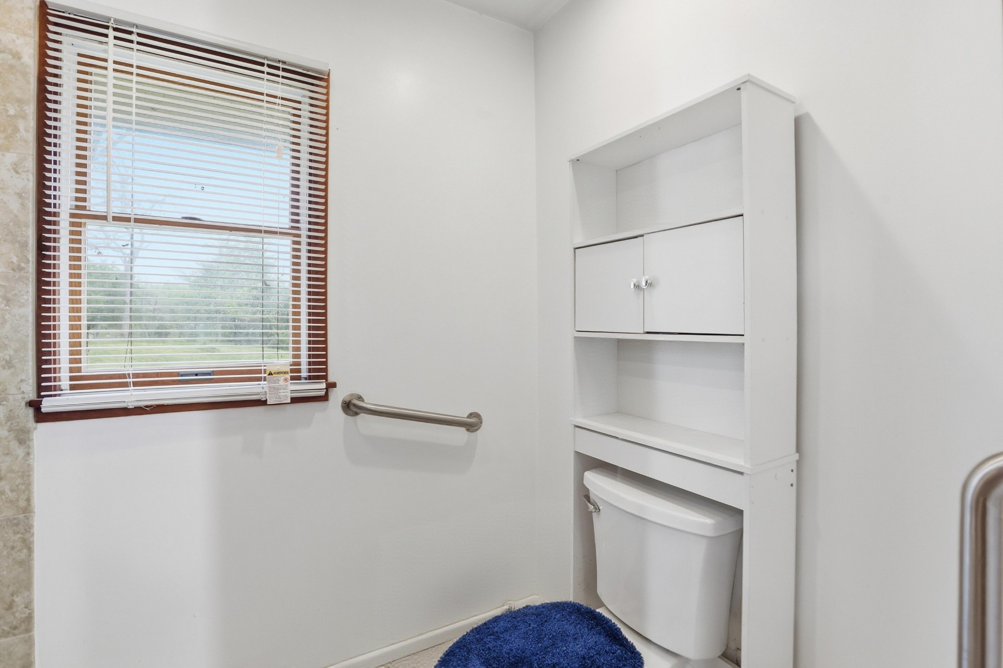 1071 Simms Heights Road Kingston Springs, TN 37082 - Photo 21 of 38 a view of an empty room with a window