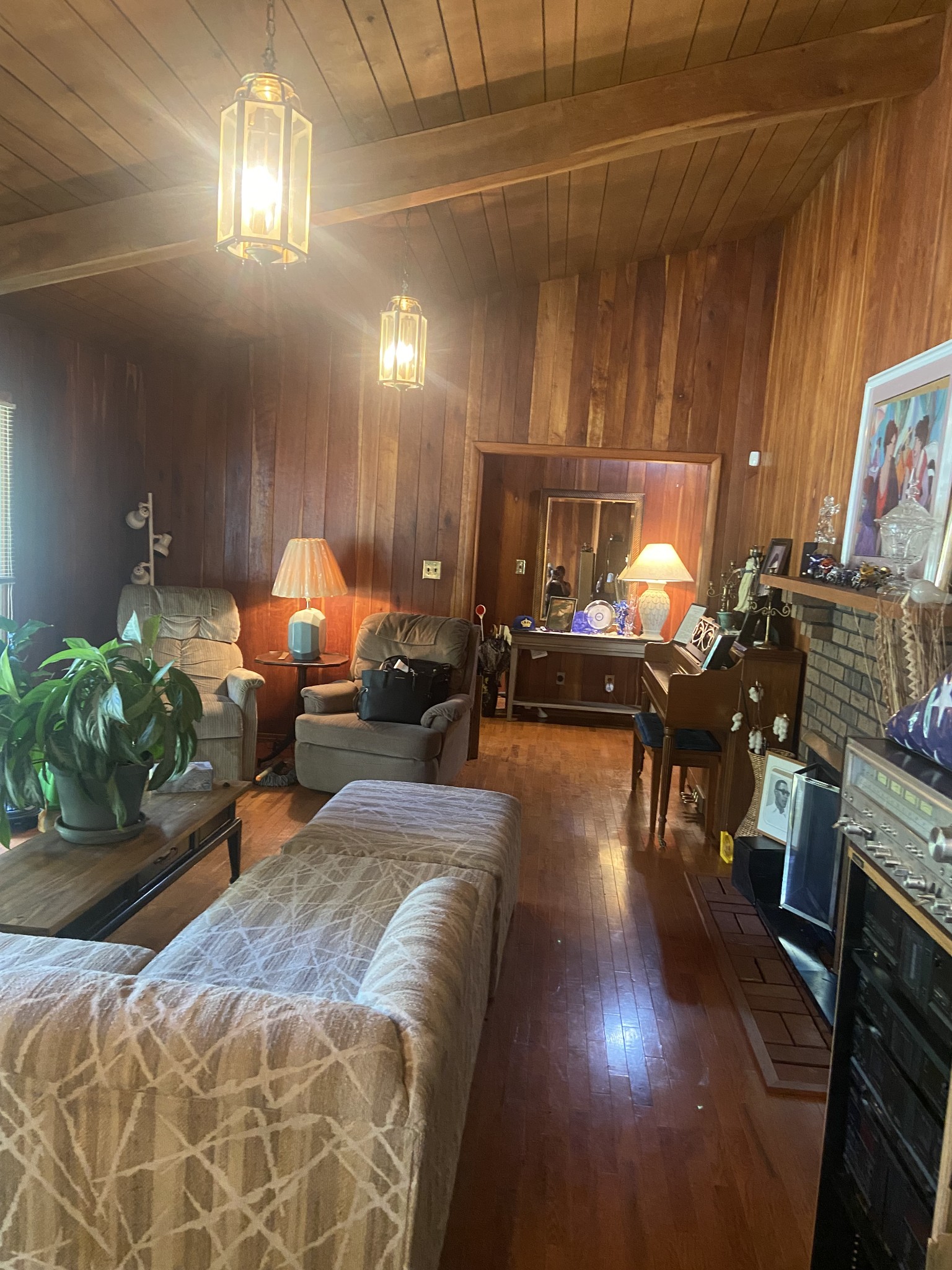 1071 Simms Heights Road Kingston Springs, TN 37082 - Photo 5 of 31 a living room with furniture and a chandelier