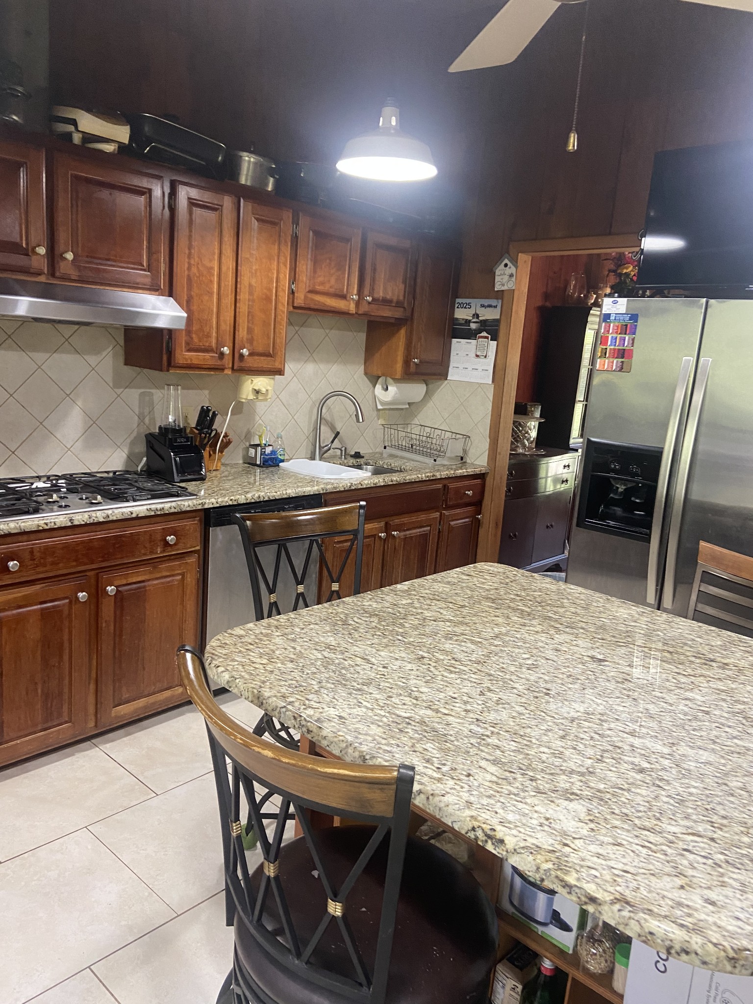 1071 Simms Heights Road Kingston Springs, TN 37082 - Photo 8 of 31 a kitchen with granite countertop a sink appliances and cabinets
