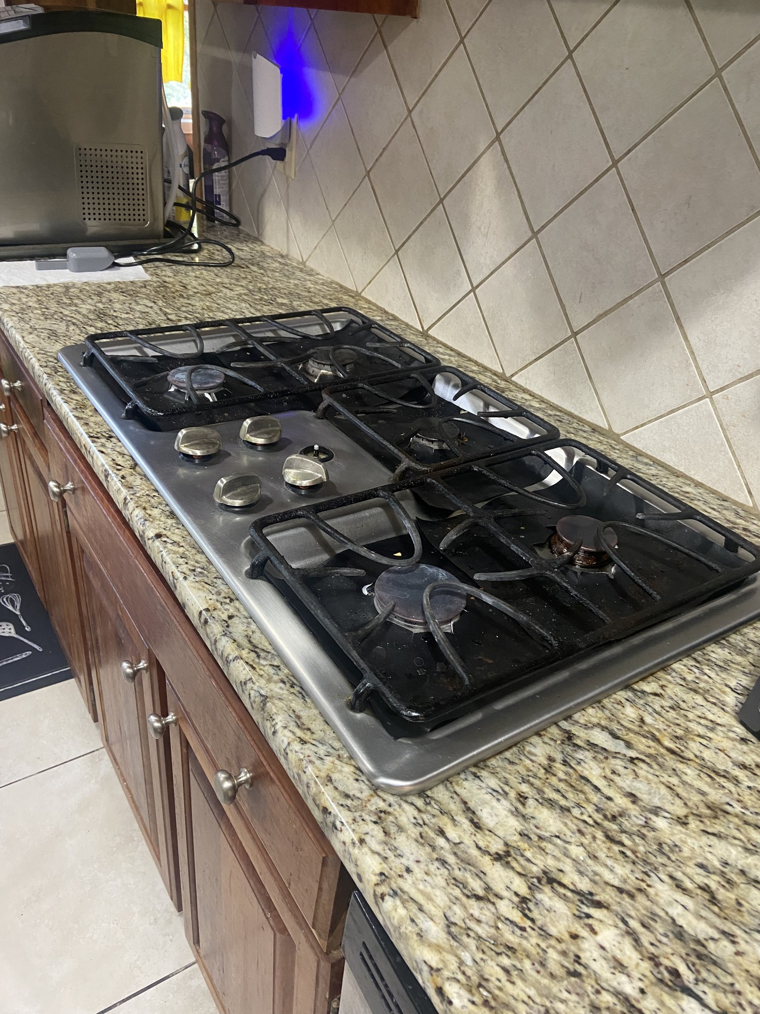 1071 Simms Heights Road Kingston Springs, TN 37082 - Photo 10 of 31 a stove top oven sitting inside of a kitchen