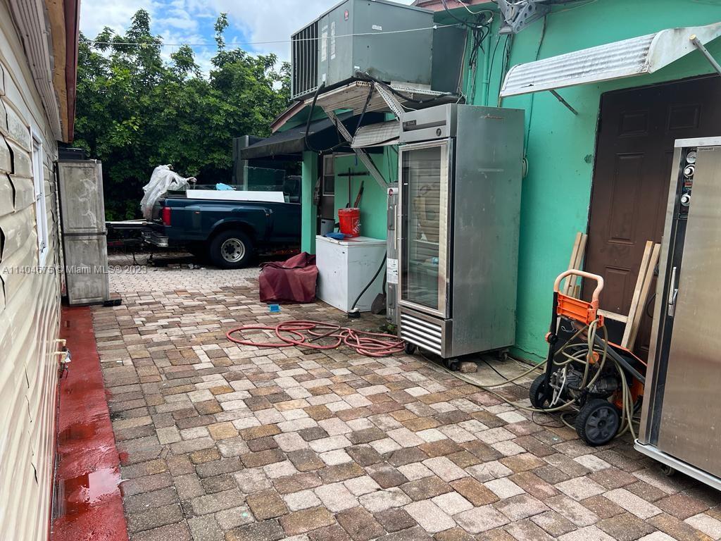 1329 Sunrise Road West Palm Beach, FL 33406 - Photo 16 of 28 a view of outdoor space and deck kitchen