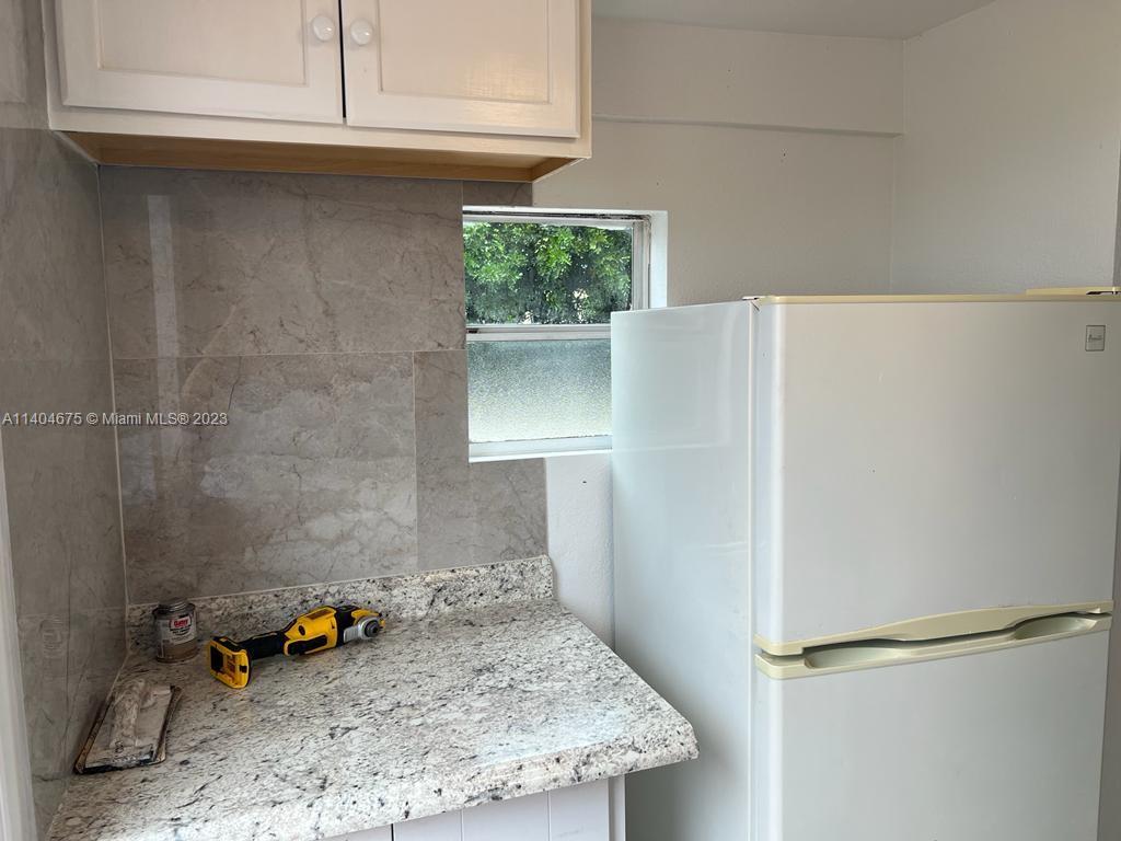 1329 Sunrise Road West Palm Beach, FL 33406 - Photo 22 of 28 a view of a storage and utility room