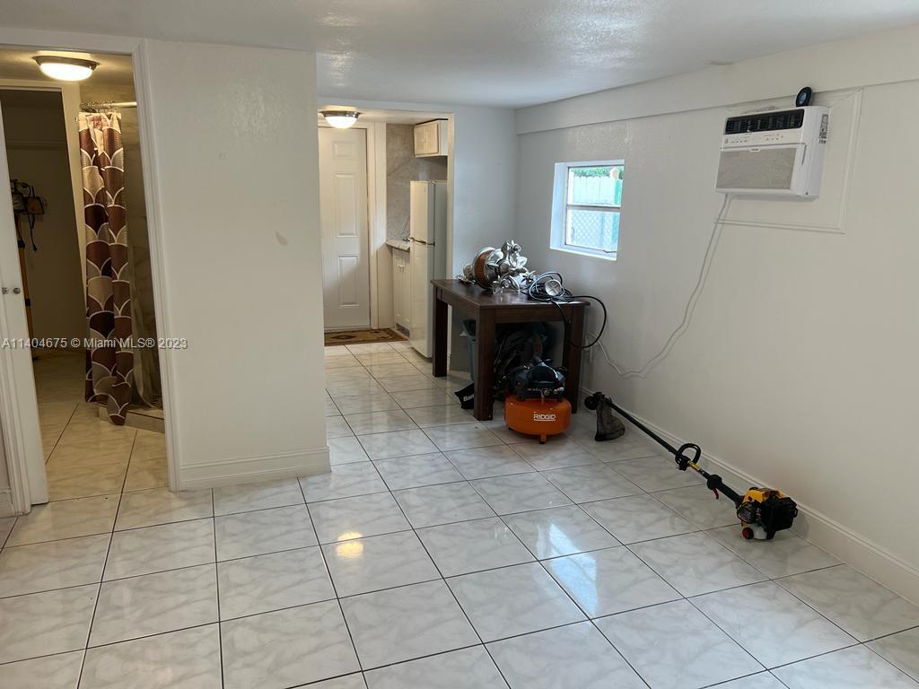 1329 Sunrise Road West Palm Beach, FL 33406 - Photo 23 of 28 a view of a storage & utility room in a room