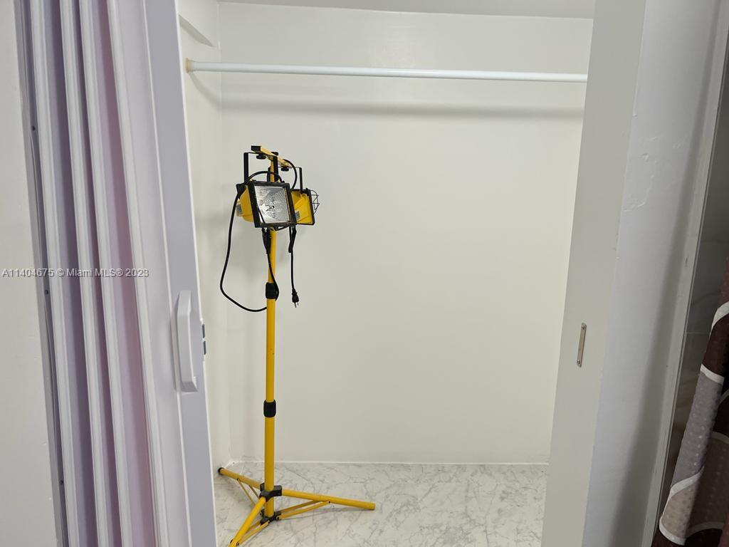 1329 Sunrise Road West Palm Beach, FL 33406 - Photo 25 of 28 a door with a mirror on the wall