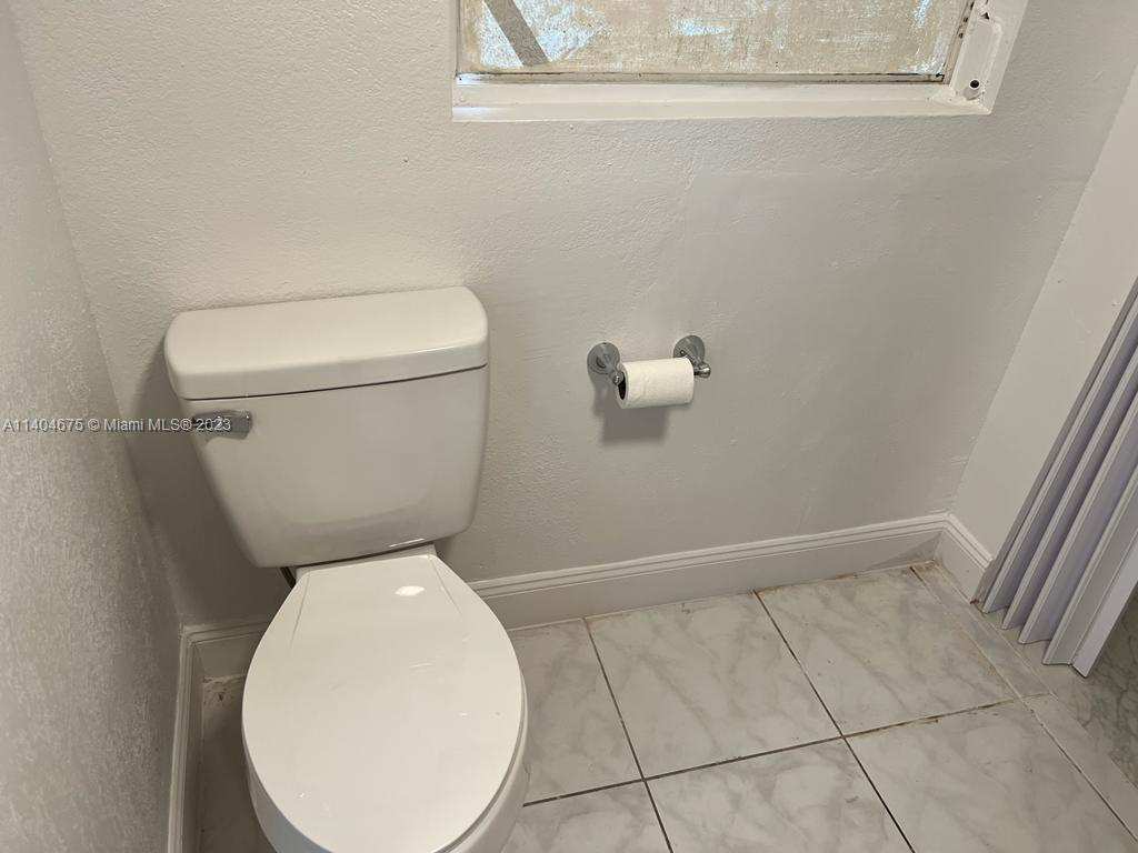 1329 Sunrise Road West Palm Beach, FL 33406 - Photo 26 of 28 a close view of a toilet in bathroom
