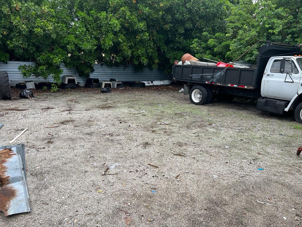 1329 Sunrise Road West Palm Beach, FL 33406 - Photo 28 of 28 a view of a backyard with a sitting area