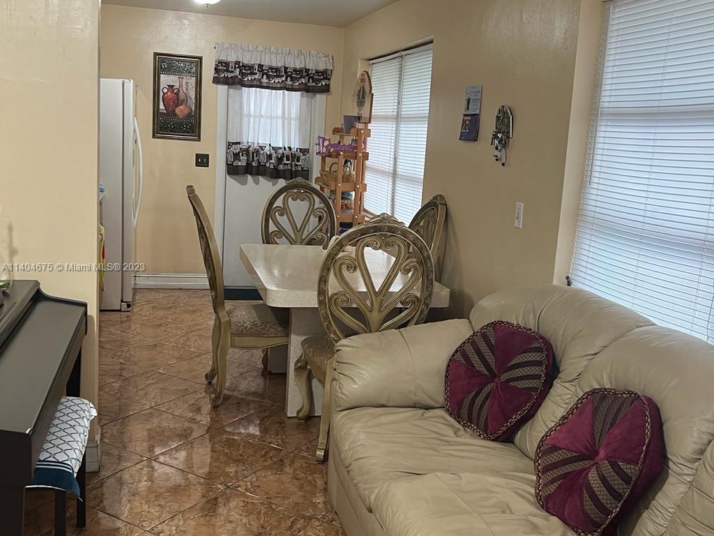 1329 Sunrise Road West Palm Beach, FL 33406 - Photo 5 of 28 a view of a livingroom with furniture and windows