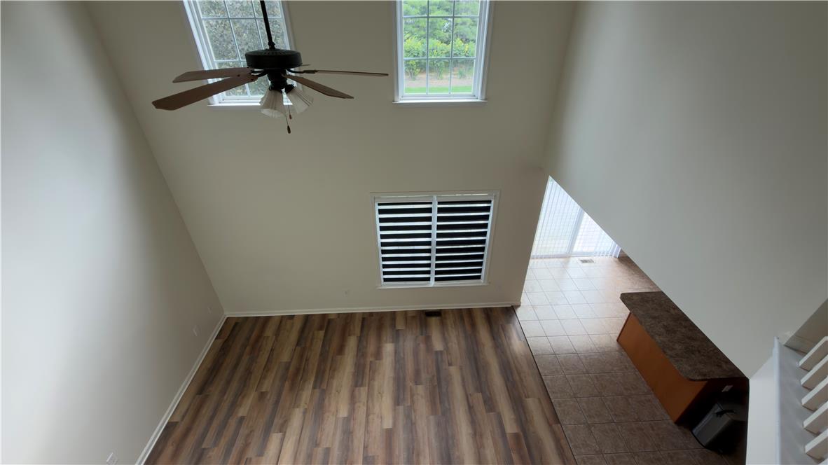 4172 Ross Road Bethlehem, PA 18020 - Photo 16 of 16 High ceilings and towering windows overlook the spacious main floor plan with wood flooring.