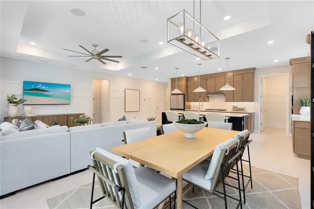 a bedroom with a large bed and a large window