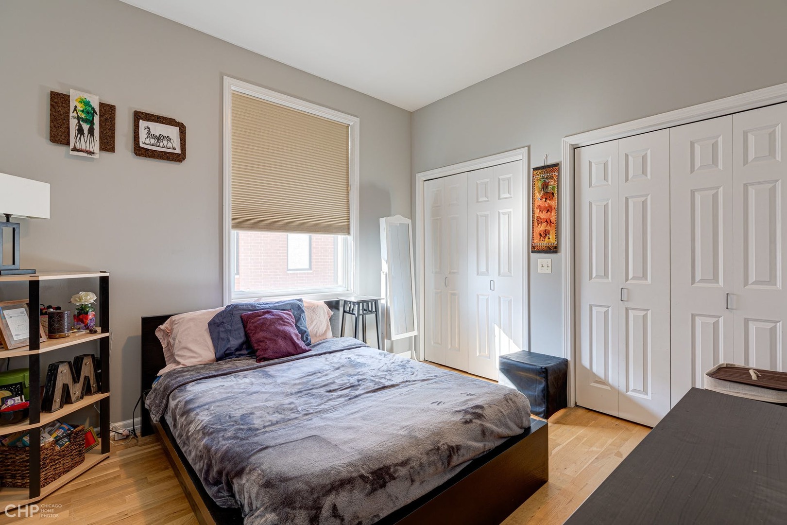2127 West Rice Street, Unit 3W Chicago, IL 60622 - Photo 15 of 17 a bedroom with a bed and a window