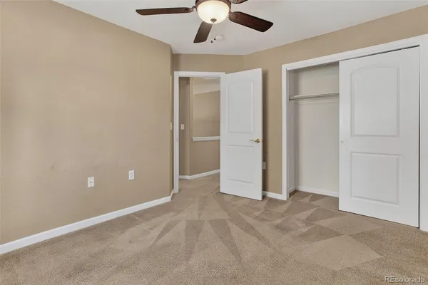 a bathroom with a toilet and a bathtub