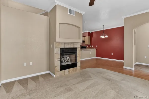 a kitchen with stainless steel appliances granite countertop a stove and a refrigerator