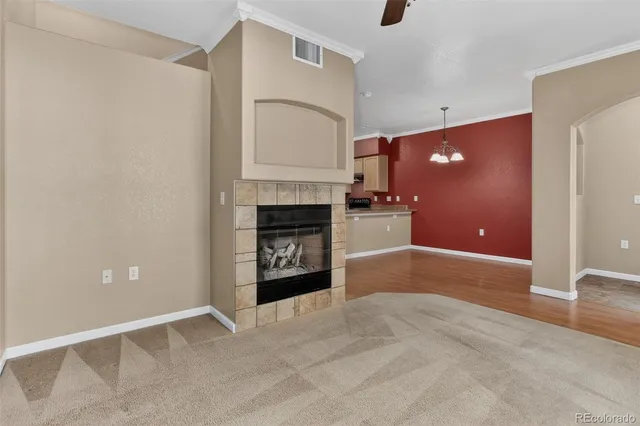 a kitchen with stainless steel appliances granite countertop a stove and a refrigerator