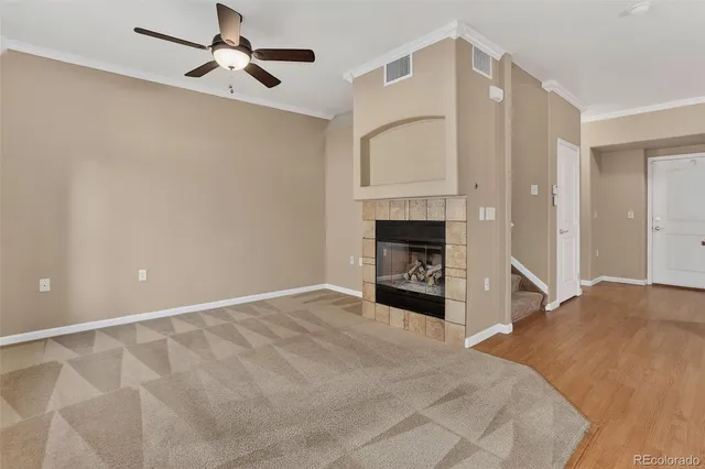 a kitchen with sink cabinets and wooden floor