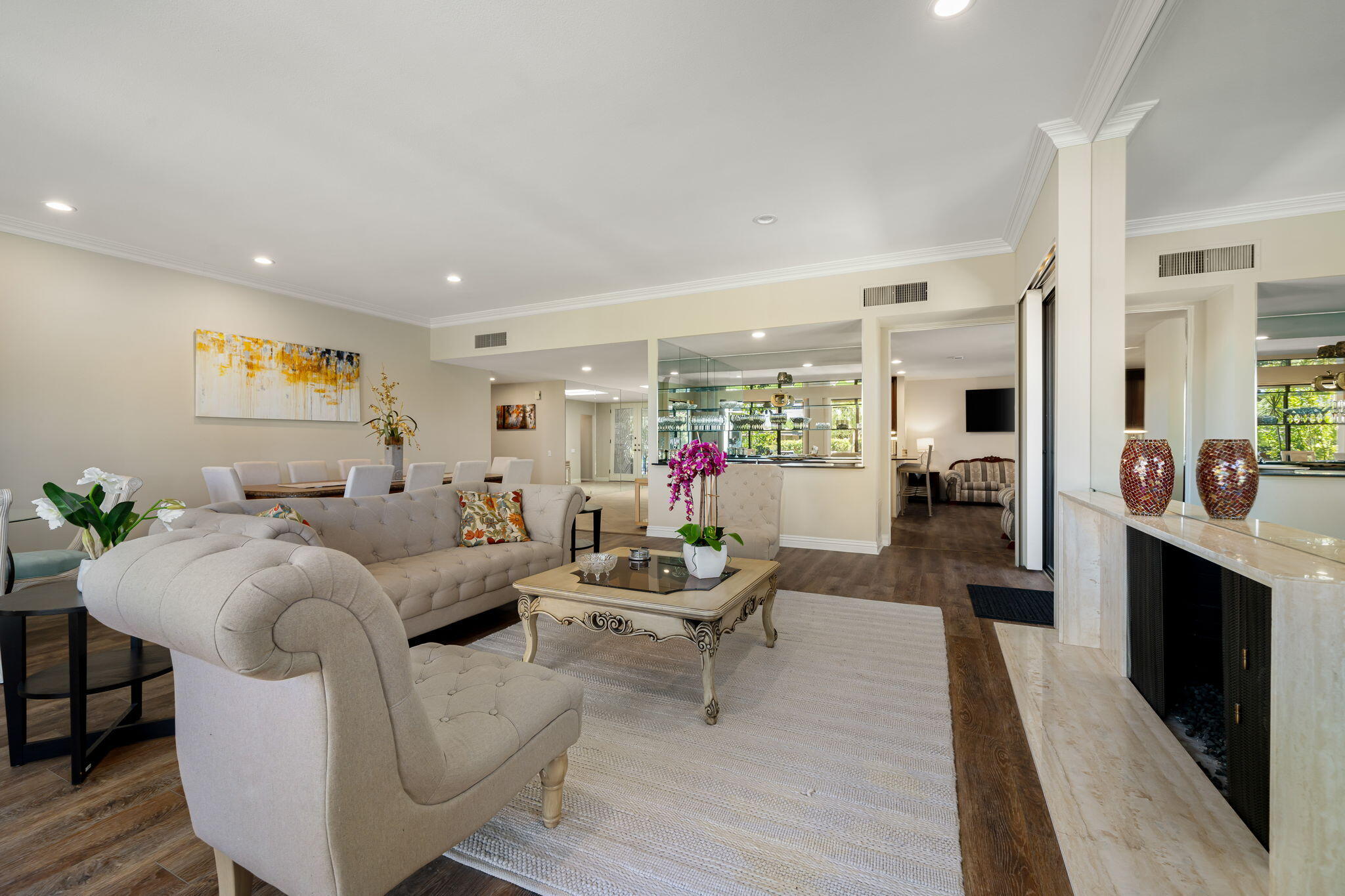 140 Columbia Drive Rancho Mirage, CA 92270 - Photo 18 of 42 a living room with furniture and a wooden floor