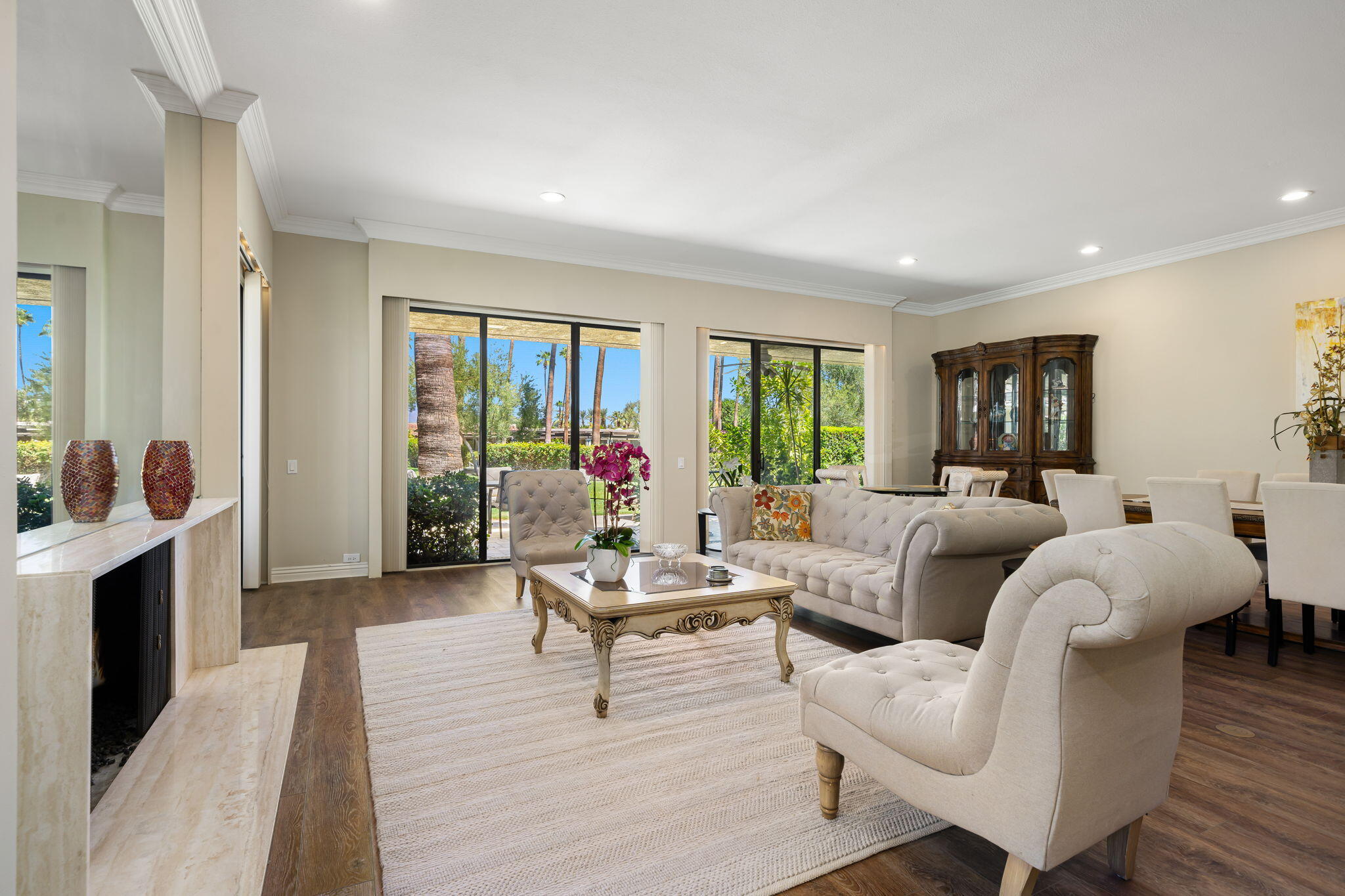 140 Columbia Drive Rancho Mirage, CA 92270 - Photo 19 of 42 a living room with furniture and a large window