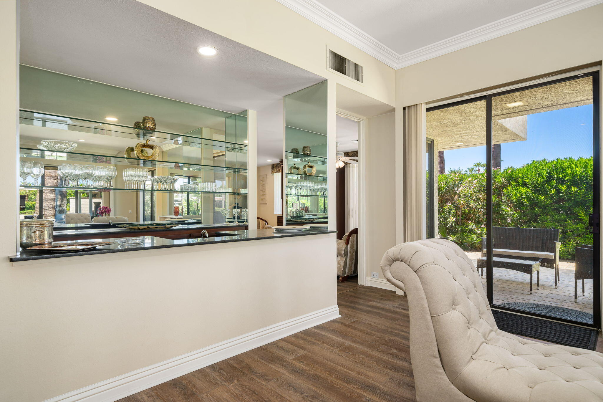 140 Columbia Drive Rancho Mirage, CA 92270 - Photo 20 of 42 a very nice looking room with a large window and furniture