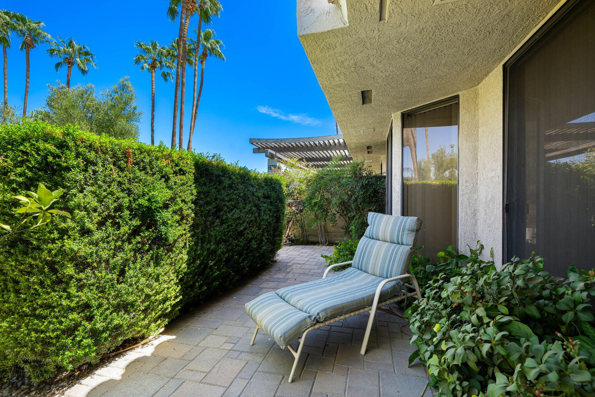 140 Columbia Drive Rancho Mirage, CA 92270 - Photo 33 of 42 a house view with a seating space