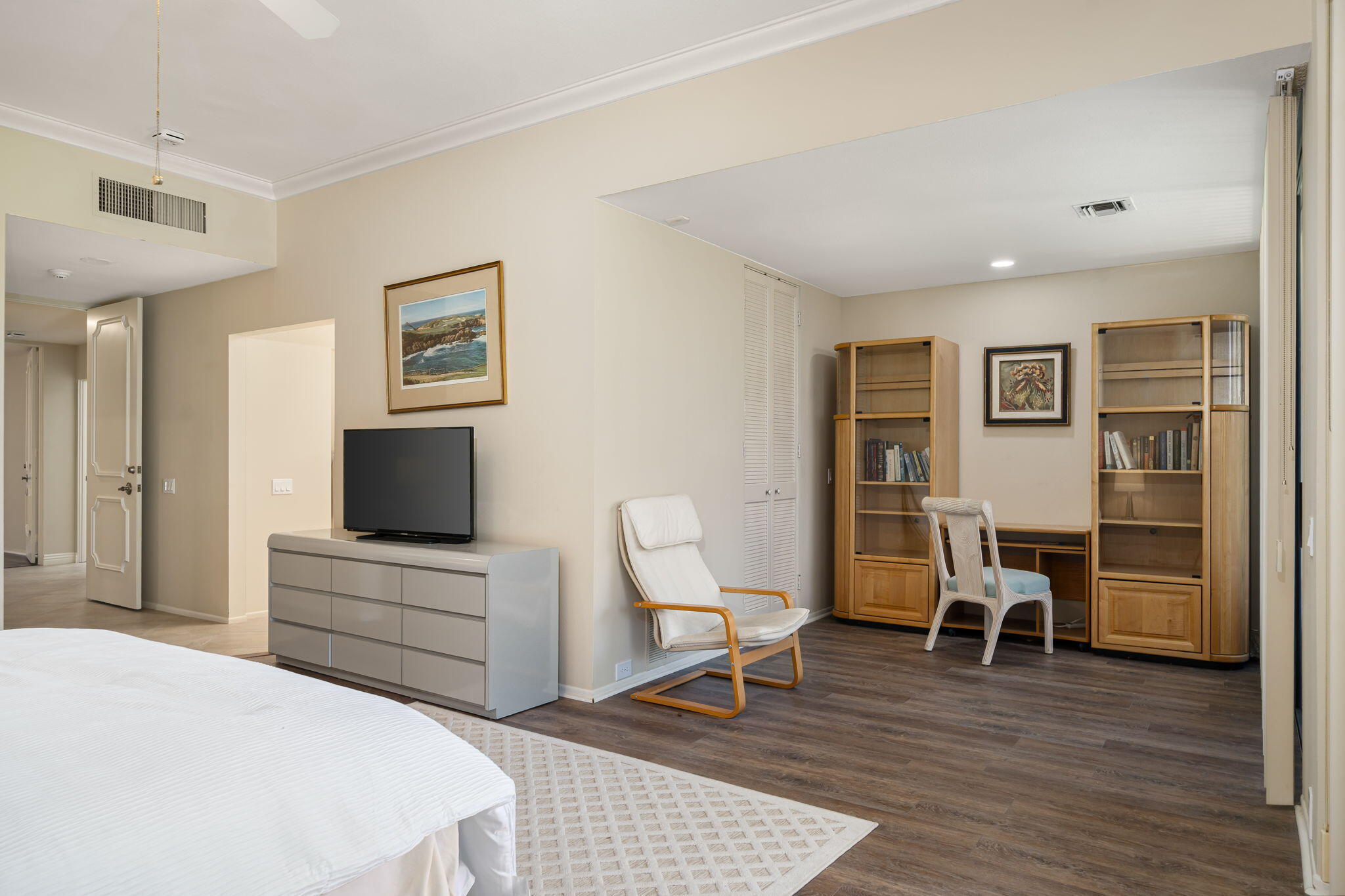 140 Columbia Drive Rancho Mirage, CA 92270 - Photo 35 of 42 a living room with furniture and a flat screen tv