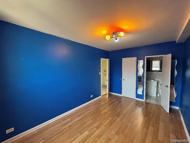 a view of a livingroom with a workspace