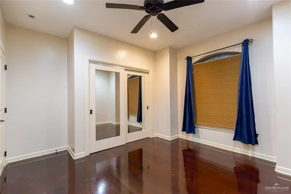 a view of an entryway with front door