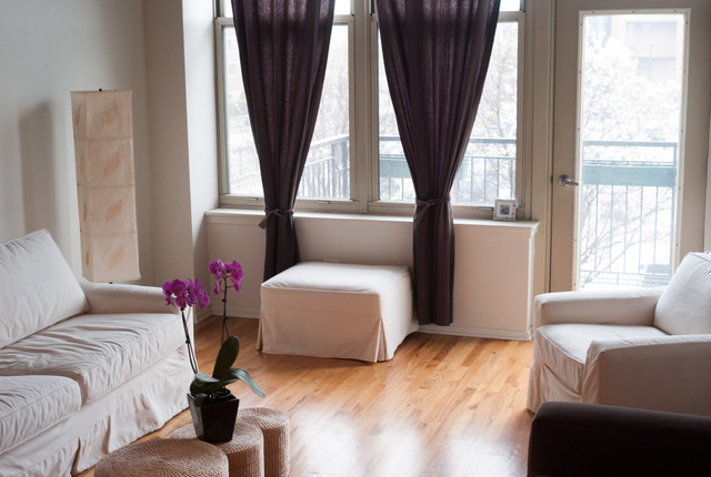 6 South Laflin Street, Unit 308 Chicago, IL 60607 - Photo 13 of 16 a living room with furniture and a large window