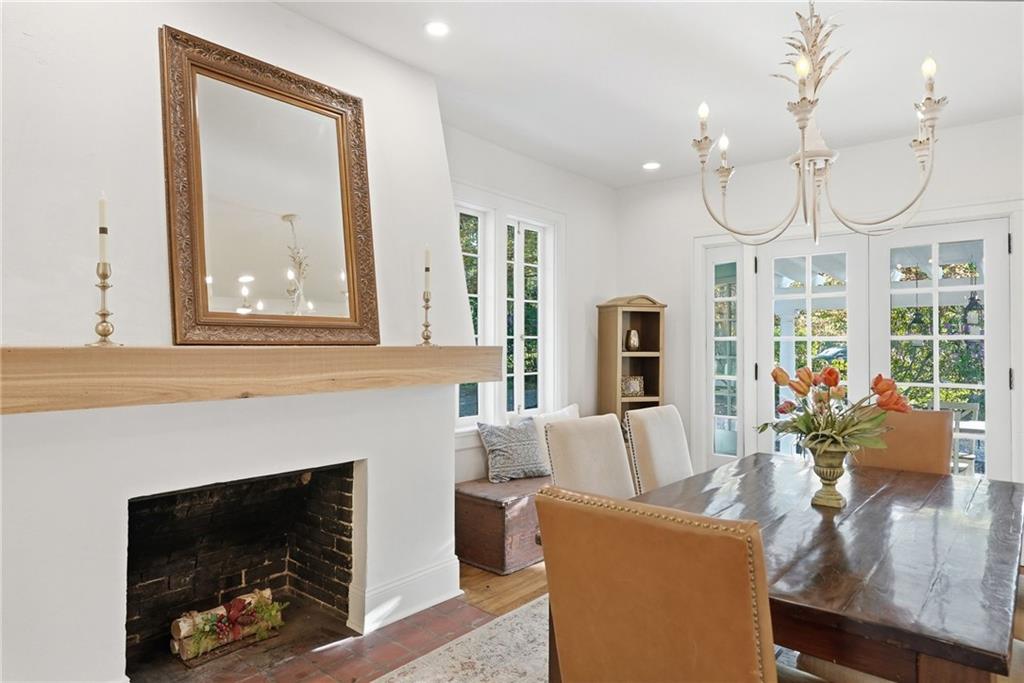 3944 Bakerstown Road Gibsonia, PA 15044 - Photo 22 of 50 a living room with furniture a fireplace and a chandelier