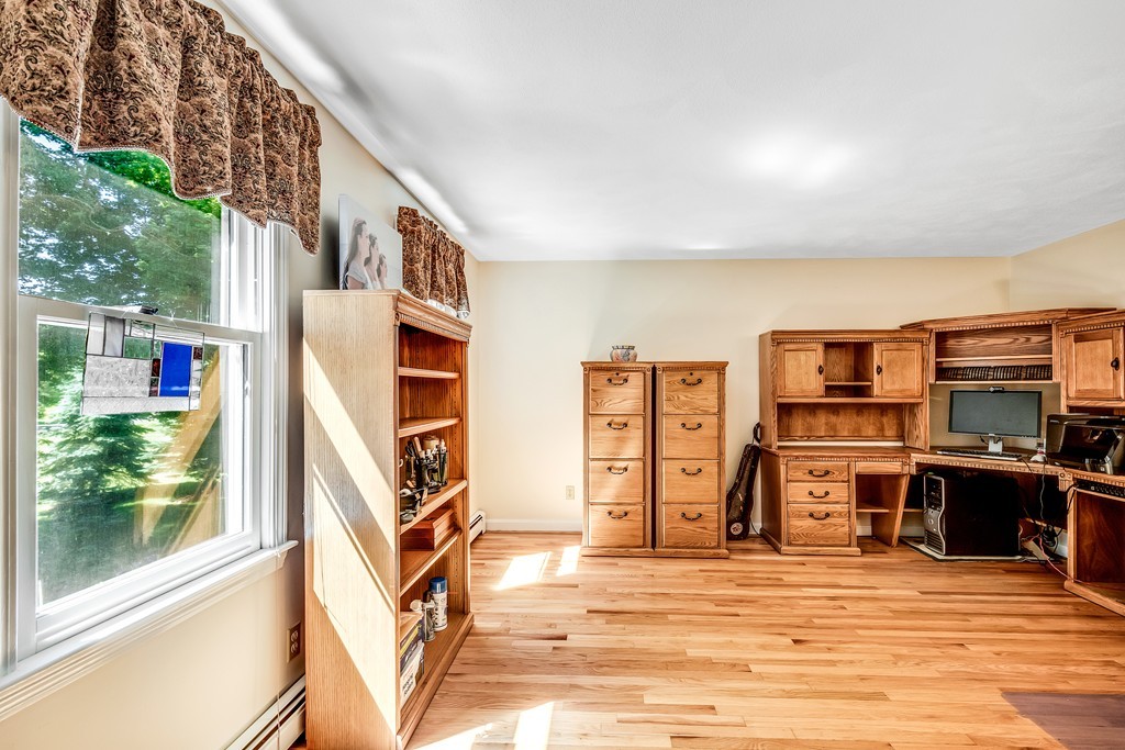 178 Reed Farm Road Boxborough, MA 01719 - Photo 12 of 30 a view of a living room with furniture and kitchen view